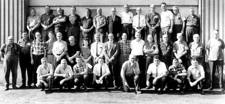 Men posing for a picture in 1969